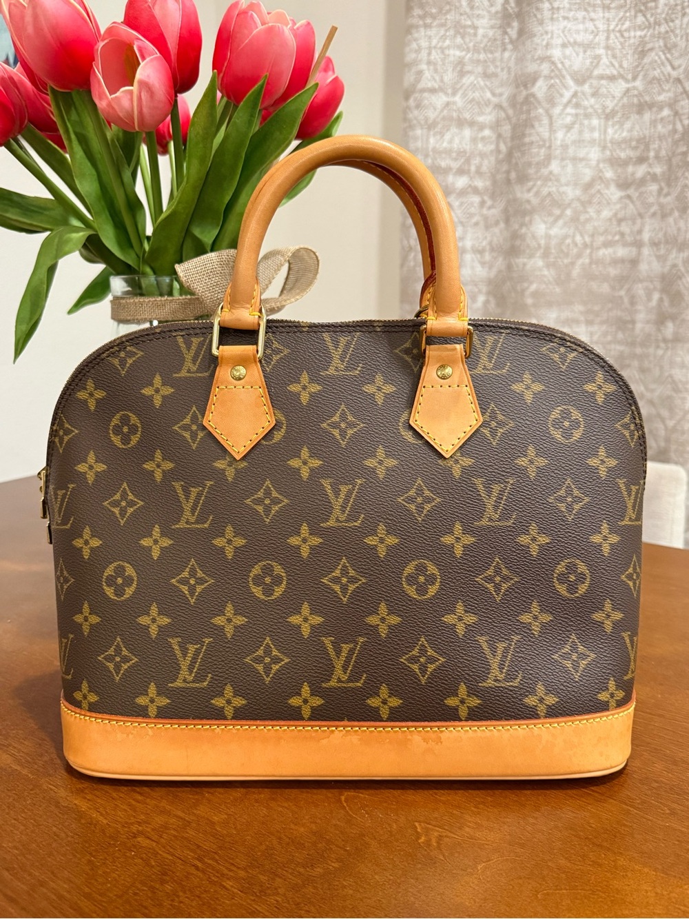 Louis Vuitton Alma PM Monogram Satchel with Vachetta Trim - Pre-owned